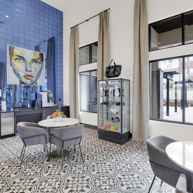 Ember Peaks at American Fork - Living Space with Collections, Luxury Bags, and Large Painting