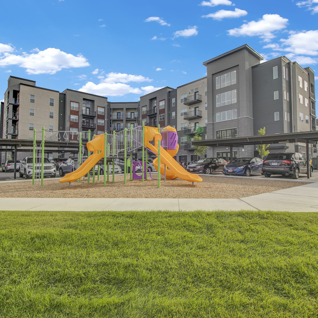 Ember Peaks at American Fork - Playground with Parking and Exterior View of Apartments